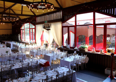 Riverdale Barn the Main barn set up for wedding looking outside into the Courtyard